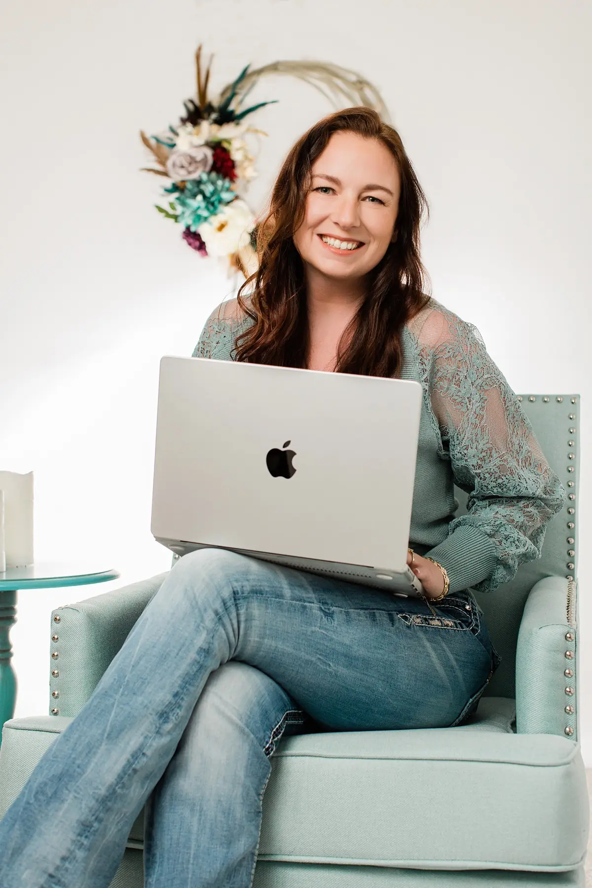 Larissa Mayfield working on a laptop