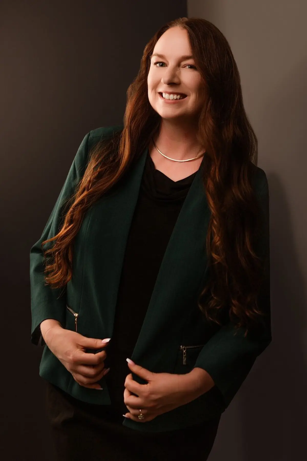 Larissa Mayfield in a green blazer